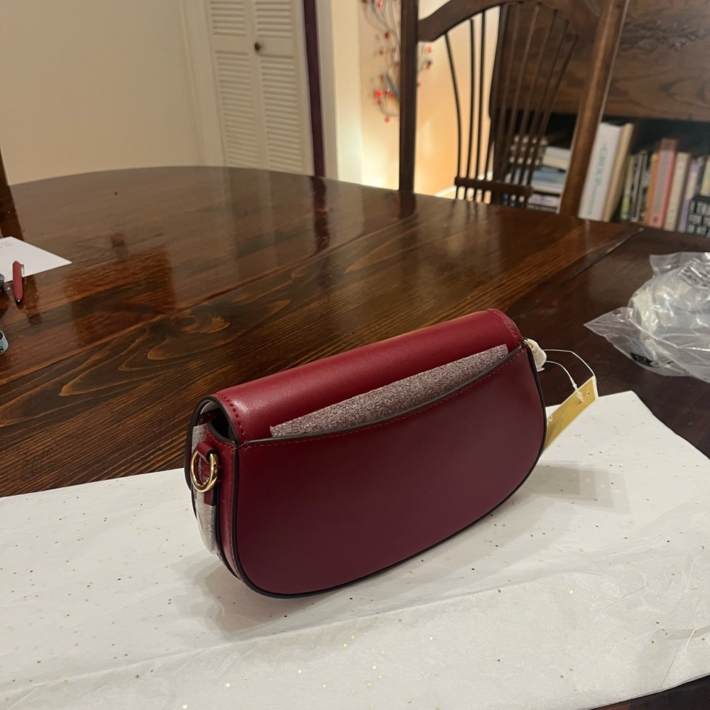 Michael Kors Burgundy Leather Clutch with Gold Accent - Picture 4 of 6